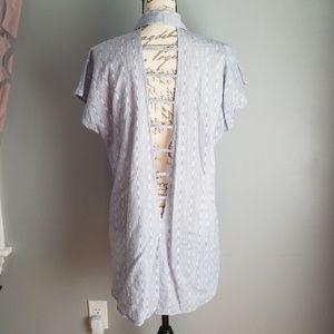 Long button down tunic with detailed back. Size S
